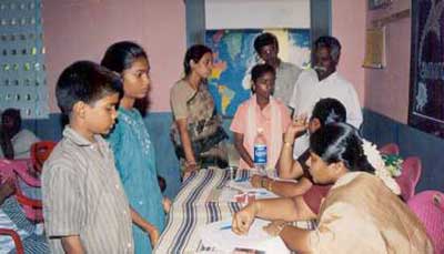 [Photo] District Revenue Officer, Additional District Magistrate and District Education Officer persuading child laborers from kadambatur block to get enrolled